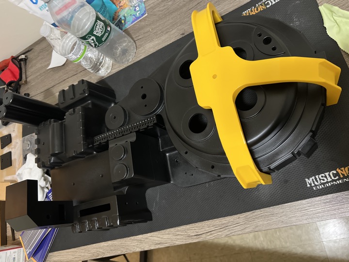 Black pack components and yellow bumper arranged before the finishing details.